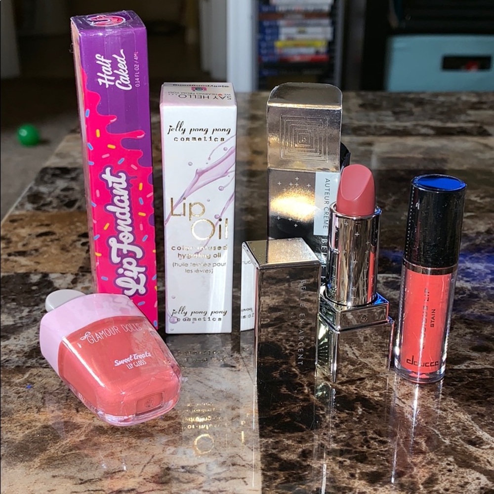 Lipstick, lip oil, and lip gloss bundle.